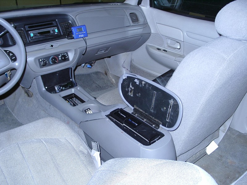1995 police interceptor interior with bucket seats and black rubber 